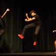 Scout Martin, Collin Cantillo, and Kyleigh Cole bell kick at the end of their performance of "Fame & Fortune" from Rudolph. 