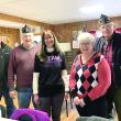 From left, American Legion Post 54’s Cliff Hendricks and Mike Barnes, Team Willow’s Beth Bluteau, Cooper-DiPerri Scholarship Fund Committee member Sheila Sawyer and Post 54 Cmdr. William Cossette Jr. gather at the Legion hall on Route One, Wiscasset March 22 to talk about the post’s recent donations to both causes. SUSAN JOHNS/Wiscasset Newspaper 