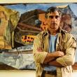 Joseph Fiore with his painting "Virgo Tiger" in 1987. Photo: Peggy McKenna, courtesy the Penobscot Marine Museum