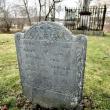 Dated 1739, the headstone of Joshua Pool is the oldest one in the Ancient Cemetery. According to the legend, Pool drowned in the Sheepscot River when an enraged black capsized his canoe. In the background can be seen the Chief Justice Samuel Smith memorial. PHIL DI VECE/Wiscasset Newspaper