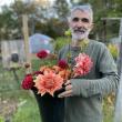 Alain Ollier with dahlias. Courtesy of Veggies to Table