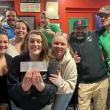 The crew at Pier 1 Pizza & Pub prove knowledge is power with the donation to Midcoast Humane raised from weekly trivia nights. Courtesy of Winter Page