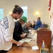 Counting written ballots for warrant Article 15. FRITZ FREUDENBERGER/Boothbay Register