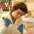 Lead author, Shane Farrell, examines algae samples in the lab. Farrell spent several months on a research visit with co-author Daniel Petras’s at the University of Tübingen in Germany. Courtesy Bigelow Laboratory for Ocean Sciences