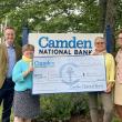  Simon Griffiths, CEO of Camden National Bank, with, from left, Finding Our Voices Board Member Elizabeth True; CEO and Founder Patrisha McLean, and Tina Flewelling, manager of the Blue Hill branch of Camden National Bank.  Photo courtesy Finding Our Voices