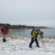 Jeff Wells and another birder scoping for sea ducks and loons on the Matinicus Island Christmas Bird Count. Courtesy of Bethany Woodworth.
