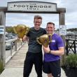 Runner-up Christoph Aeppli and winner Kevin Posman pose with their trophies May 15 during Bigelow's tenth annual Fun Run & Walk for Colorectal Cancer Awareness.  Courtesy of Leah Campbell