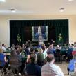 CTL's founder Nancie Atwell speaks to a crowd of alumni and current families in the school's auditorium. Courtesy photo
