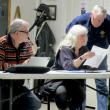 Chairman David King, Sr. looks over the wording of the warrant article with selectman Allison Hepler. Seated at the left is Selectman Tommy Davis. PHIL DI VECE/Wiscasset Newspaper
