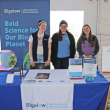 Associate Curator Kerry Thurlow, Research Technician Lydia Pinard, Senior Research Associate Brittney Honisch, and Postdoctoral Scientist Sarah Douglas (not pictured) helped staff Bigelow Laboratory’s booth at the Seaweed Saturday expo (Credit: Leah Campbell)