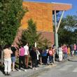 At one point the line of voters waiting to get into the town meeting at the Woolwich Central School stretched outside the building. PHIL DI VECE/Wiscasset Newspaper
