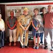 Chapman-Hall House Committee members and volunteers honor the work of David Griffin, who designed the timeline display. Pictured from left: William Brewer, Louise Miller, Deane Brewer, Calvin Dodge, Kathy Moran, Patti Whitten, David Griffin, and Jeff Miller. Elizabeth Potter photo