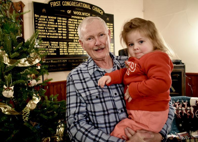 David King Sr. holds his greatgrand daughter Millie Mae, age 2, daughter of Maxwell Gurney and Mya Doore of Woolwich. PHIL DI VECE/Wiscasset Newspaper