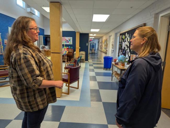 On left, Executive Director Ashley Butterfield talks with LC Administrator Carrie Kipfer about Respite Care’s facility and programs. Courtesy photo  