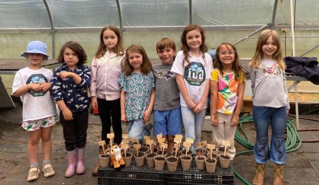 Veggies to Table kicked off its expanded educational offerings with "Tiny Farmers," an opportunity for children to get their hands dirty while learning about the process of growing food. Courtesy of Erica Berman.