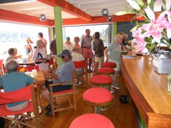 Oliver's Cozy Harbor Wharf on Southport boasts an eye catching color interior, great views of Cozy Harbor and creative, delicious and healthy cuisine. The counter was constructed from the bowling alley floor of Gus and Em Pratt’s Store. DIANE RANDLETT/Boothbay Register Oliver's Cozy Harbor Wharf. DIANE RANDLETT Boothbay Register