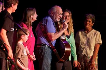 With the audience frequently singing along, Peter Yarrow brought smiles across the generations at the Boothbay Opera House. From young Dillion/Dylan belting out Puff the Magic Dragon, to Morgan Mitchell (pictured) arm in arm with the folk icon, it was an evening to remember. Courtesy of Robert Mitchell