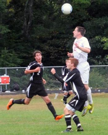 Zack Ellison gets up high and heads the ball in Mountain Valley Conference action. KATHY ONORATO/Wiscasset Newspaper Zack Ellison gets up high and heads the ball in Mountain Valley Conference action. KATHY ONORATO/Wiscasset Newspaper