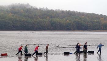 Wiscasset Middle School eighth graders head out to the flats on Polly Clark Cove. Courtesy of Wiscasset Middle School 