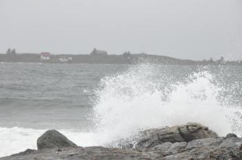 Waves crash against Ocean Point on Monday, Oct. 29, as Hurricane Sandy moves through the Midcoast. High tide and strong wind pushed seas up to nine-foot swells around noon. BEN BULKELEY/Boothbay Register