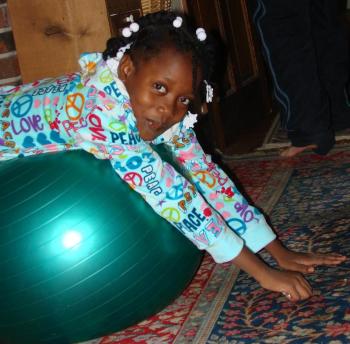 Rose Julie Reby of Haiti having fun at Nancy Call's Dresden home in October 2010 during her first stay in Maine for heart surgery. SUSAN JOHNS/Wiscasset Newspaper