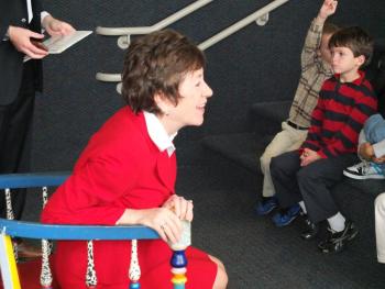 The U.S. senator reads to and answers questions from second graders. JOHN MAGUIRE/Wiscasset Newspaper