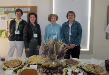New members of The Garden Club of Wiscasset are welcomed with coffee and pie October 29. From left to right are Katie Bryant, Virginia Milligan, Carol Martin and Joan Sartoris. Courtesy of The Garden Club of Wiscasset
