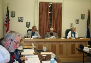 Lincoln County Budget Commissioners answer questions from budget committee members at a meeting November 8 discussing budget items. Left to right, commissioners Sheridan Bond, William Blodgett and Lynn Gilley Martin. Below, Kenneth Mason of the Lincoln County Sheriff’s Department combs over his department’s budget line item by line, and newly-elected Hamilton Meserve observes the process of the meeting. CHARLOTTE BOYNTON/Wiscasset Newspaper Lincoln County Budget Commissioners answer questions from budget committee members at a meeting November 8 discussing budget items. Left to right, commissioners Sheridan Bond, William Blodgett and Lynn Gilley Martin. CHARLOTTE BOYNTON/Wiscasset Newspaper