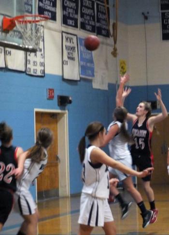 Alecia Faukingham, No. 15, goes after a rebound. KATHY ONORATO/Wiscasset Newspaper