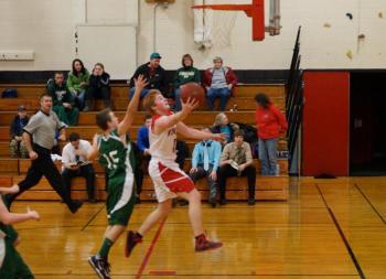 Matt Craig takes the ball to the basket.