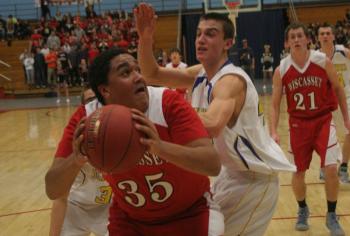 Dylan McMahon looks to score against Boothbay's John Hepburn. KEVIN BURNHAM/Boothbay Register