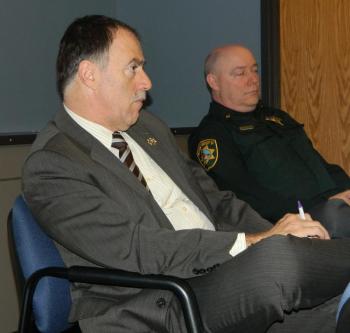 Sagadahoc County Sheriff Joel Merry, left, agreed to draft a letter to the Board of Corrections sharing the authority's concerns as to the need of reducing staff and inmates outside the two counties if the Two Bridges doesn’t receive a quarterly payment from the investment fund.  Sagadahoc Chief Deputy Bret Strout is seated on the right. CHARLOTTE BOYNTON/Wiscasset Newspaper