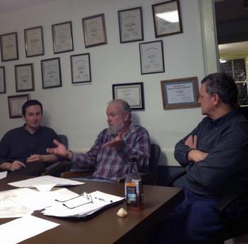Alna First Selectman David Abbott, center, makes his case to First Selectman Jonathan Villeneuve, left, and Third Selectman David Reingardt, right, that the board should be speaking out against proposed state funding cuts. SUSAN JOHNS/Wiscasset Newspaper