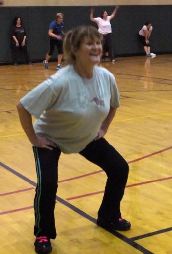 Mary Stead learns the proper squatting technique during Monday’s punishment work at Lisa Hall’s Weight Loss Challenge. KATHY ONORATO/Wiscasset Newspaper