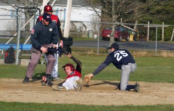 Wiscasset's Cody Graves slides safely into home in action with Telstar on Monday, April 22.