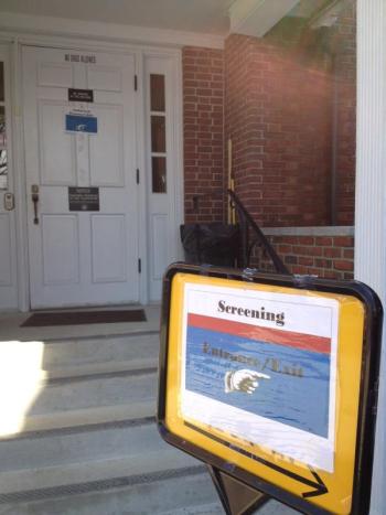 This sign and others like it direct Lincoln County Courthouse visitors away from locked doors and to the rear door, where a security screening station awaits them inside. SUSAN JOHNS/Wiscasset Newspaper