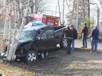 Emergency crews respond to the scene of an accident on Fort Hill Road in Wiscasset April 11. The driver, Frank Boudin is transported to a local hospital with non-life-threatening injuries. KATHY ONORATO/Wiscasset Newspaper