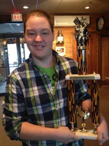 Boothbay native Christopher Holmes with the trophy he won as Mr. Maine March 24. Courtesy Miss Maine Scholarship Program