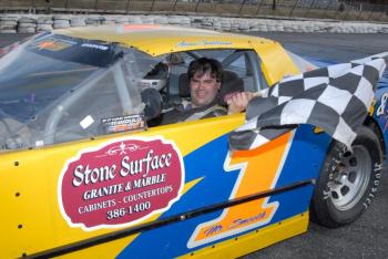 Kevin Sherman of Wiscasset wins the 30-lap N.E.4-Cylinder Prostock race at Wiscasset Speedway on April 20. Below: Woolwich's Adam Chadbourn waves the checkered flag for his win in the 25-Super Stock division. Courtesy of Peter Taylor Kevin Sherman of Wiscasset wins the 30-lap N.E.4-Cylinder Prostock race at Wiscasset Speedway on April 20. Courtesy of Peter Taylor