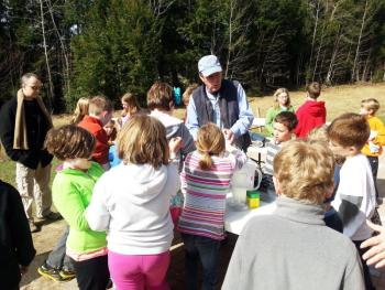 Jeff Averill of Ames Supply teaches children at the Wiscasset Community Center about spring planting. Courtesy of Wiscasset Community Center