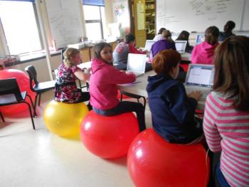 Wiscasset Middle School students try out the new exercise balls that were purchased with the Let’s Go Grant. Courtesy of Wiscasset Middle School