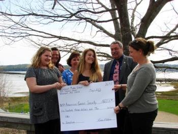 Wiscasset Middle School students and staff donate a check to the American Cancer Society on May 2. From left to right, Lily Wagg, Cindy Collamore, Carole Drury, Gabrielle Chapman, Roger Whitney and Erika Gould from the American Cancer Society Representative. SUSAN JOHNS/Wiscasset Newspaper