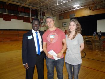 Left to right are Keynote Speaker El-Fadel Arbab (a Darfur refugee), President WHS Students for Social Justice Cormac Walsh, and WHS student Ali Lambert.