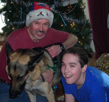 Mike Bailey and his youngest son Benjamin with their family dog, Duke, on Christmas Day 2010. Courtesy of Mike Bailey