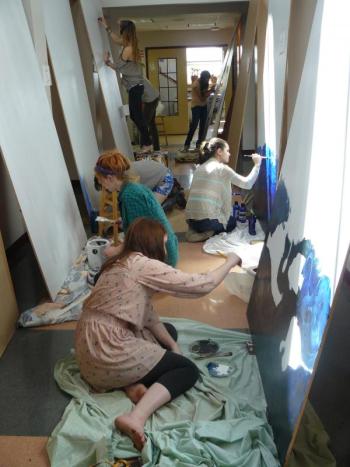 Lincoln Academy students work on the murals. Courtesy of Lincoln Academy