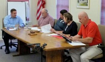 The task force at work during one of its first meetings. SUE MELLO/Boothbay Register