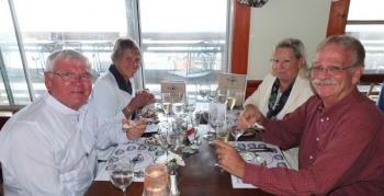 Ray and Carol Hulse, left, enjoy their first course of oysters with their good friends Jim and Janet Goff, right. RYAN LEIGHTON/ Boothbay Register