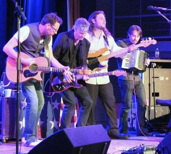 THE BODEANS rocks a packed Opera House this past Friday night. Kurt Neumann, founder and frontman, is the second from the left.     GARY DOW/Boothbay Register