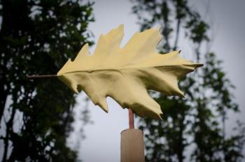 “Red Oak Leaf,” sculpted in mahogany, gold leaf, copper and cedar by John Bowdren, is part of the “Living Wood” exhibit at Coastal Maine Botanical Gardens. Curator June LaCombe will offer a walking tour on September 12. Courtesy of Frances Buerkens “Red Oak Leaf,” sculpted in mahogany, gold leaf, copper and cedar by John Bowdren, is part of the “Living Wood” exhibit at Coastal Maine Botanical Gardens. Curator June LaCombe will offer a walking tour on September 12. Courtesy of Frances Buerkens