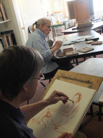 Local artists Mark Mellor and Sue Heil Kibbe at a recent life drawing class hosted by the Boothbay Region Art Foundation. LISA KRISTOFF/Boothbay Register